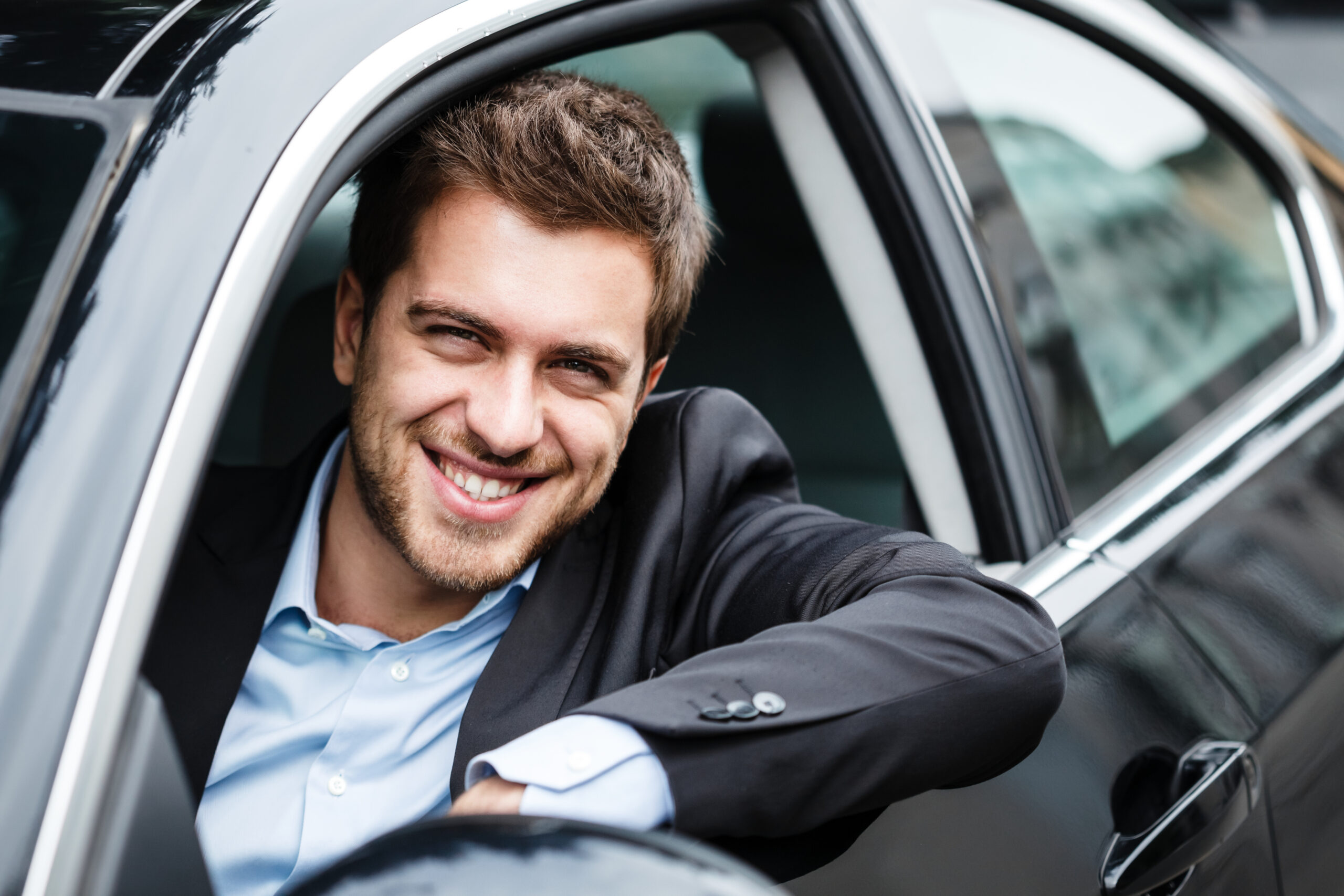 man sports car